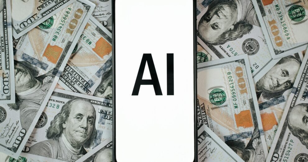 Artificial intelligence and business, profit, investment and finance concept. Top view text AI