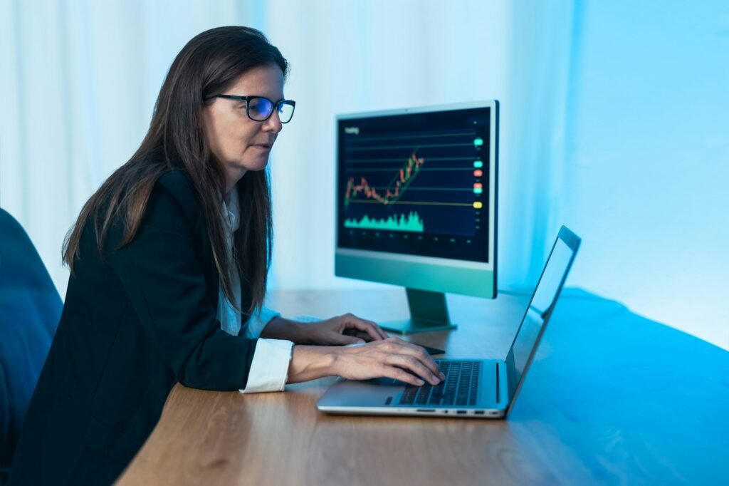 Business trader woman working on crypto currency markets with blockchain technology